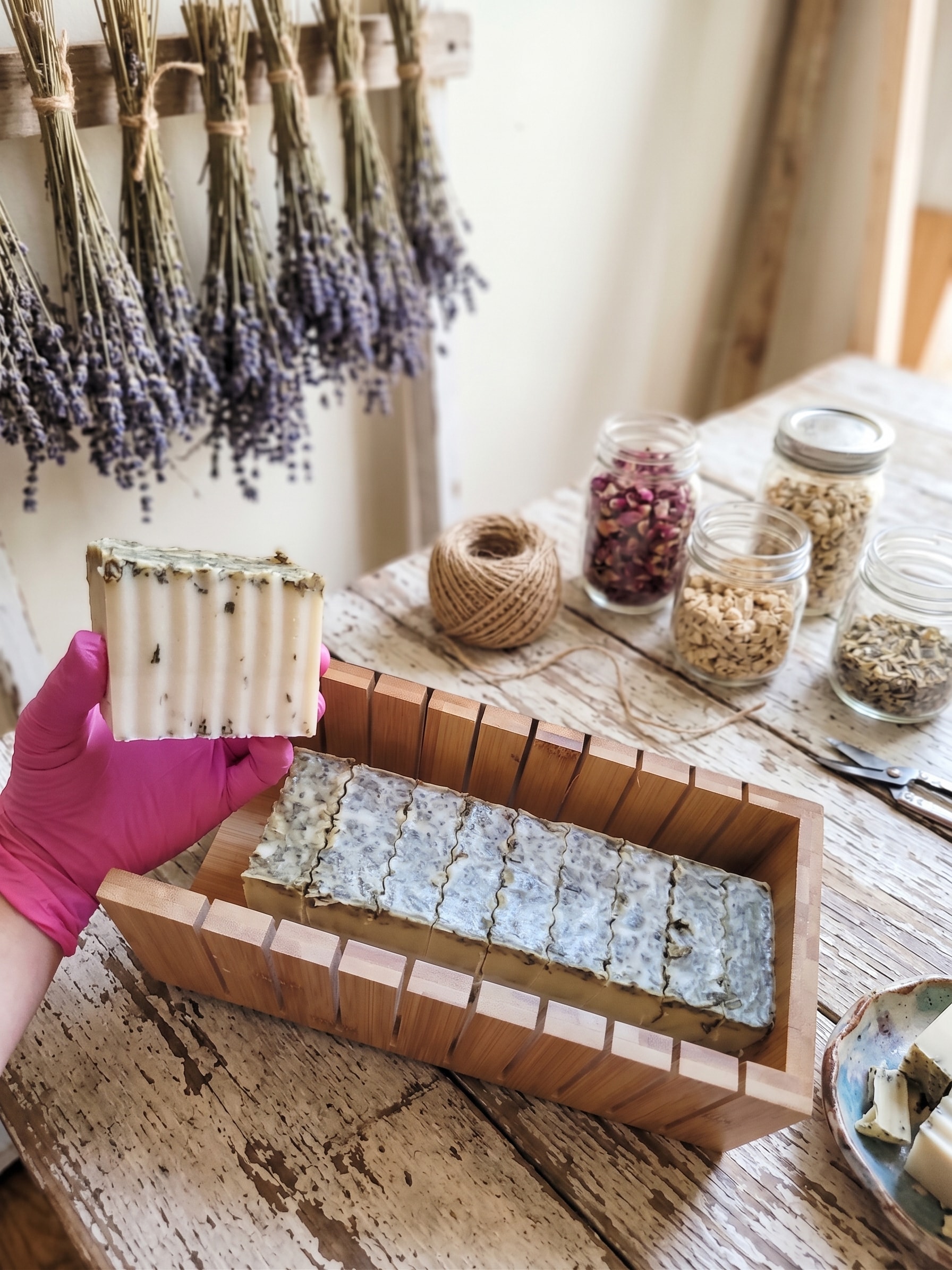 Artisan mixing natural ingredients for handmade bath products